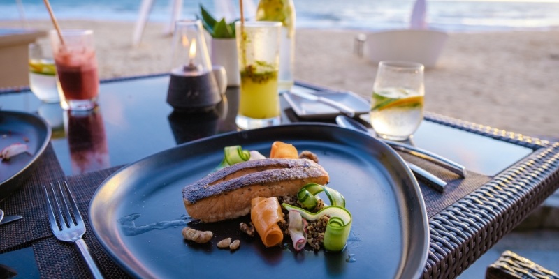A beautifully arranged plate of seafood on a table, highlighting the dining experience at a Jersey Shore restaurant.