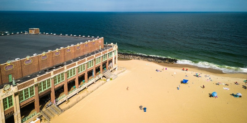 Aerial view of a beachside building in Asbury Park, New Jersey, showcasing the vibrant coastal landscape.