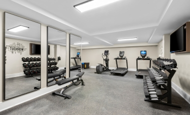 Hotel Near Hackensack University Medical Center NJ - Fitness Center A well-equipped gym with mirrors, situated in a hotel fitness center close to Hackensack University Medical Center, NJ.