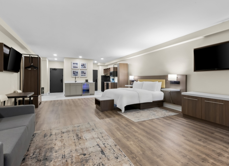 Hotel Near Sterling Ballroom - 2 Hotel room featuring a bed, desk, and television, located near the Sterling Ballroom.