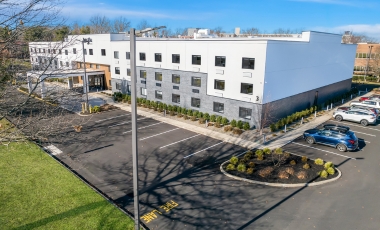Aerial view of Latitude Suites, perfect for hotel near twin lights state historic site with free self-parking