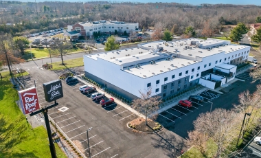 Hotel exterior in the suburbs, conveniently located near Two River Theater with free self-parking available.