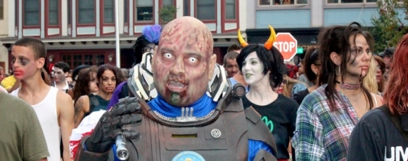 A group of people in zombie costumes participating in the Asbury Park Zombie Walk event.