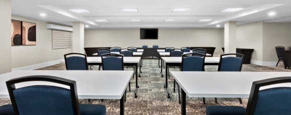 Hotel Near Seven Presidents Oceanfront Park - Meetings & Events Conference room with tables near Seven Presidents Oceanfront Park.