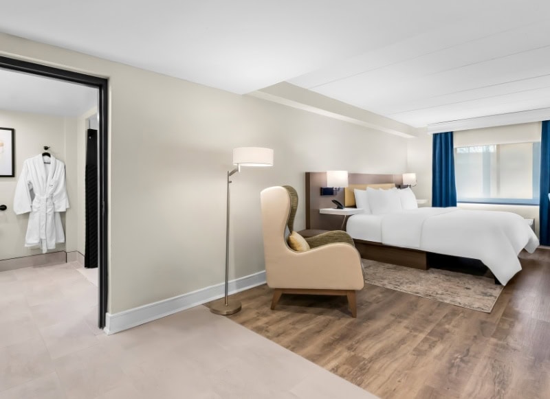 Hotel-near-Monmouth-University-2 Hotel room with seating area near Monmouth University at Latitude Suites.