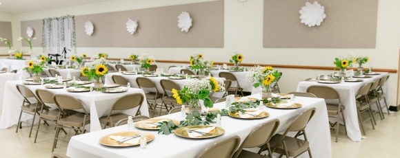 Hotel-Near-Shark-River-Golf-Course-Wedding-Room-Blocks Elegant banquet hall with tables and chairs set for wedding, romantic ambiance