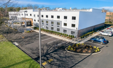 Hotel exterior with free self-parking and easy access at Latitude Suites