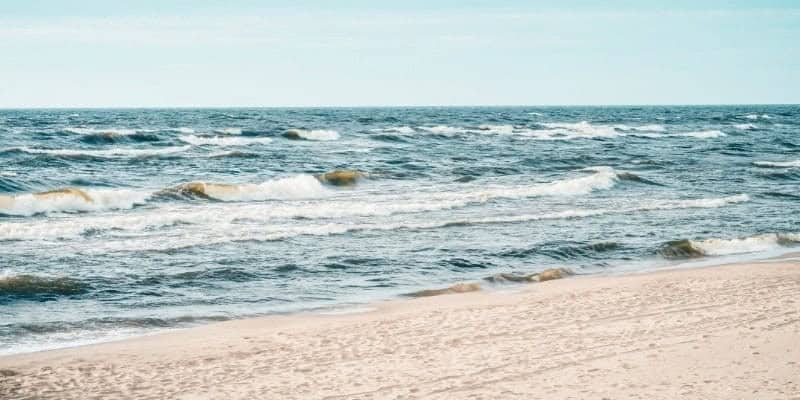 Scenic Sandy Hook beach with rolling ocean waves along the New Jersey shoreline