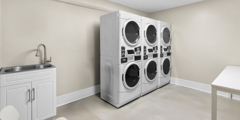 Guest laundry facilities at Latitude Suites for added convenience during long-term stays