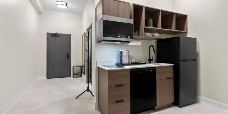 Latitude Suites kitchenette with refrigerator, microwave and dishwasher near Tinton Falls