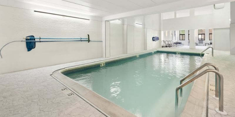 Indoor pool at Latitude Suites near Tinton Falls for relaxing extended stays