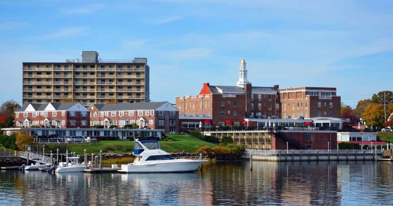 Scenic Red Bank waterfront view with brick buildings and boats.